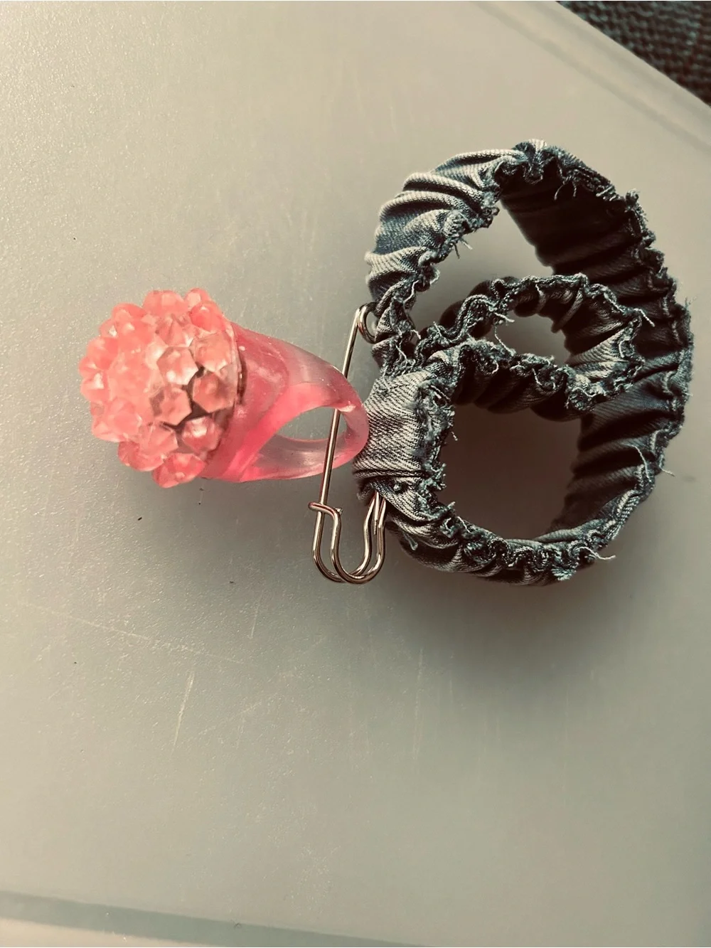 LED light up ring on denim bracelet